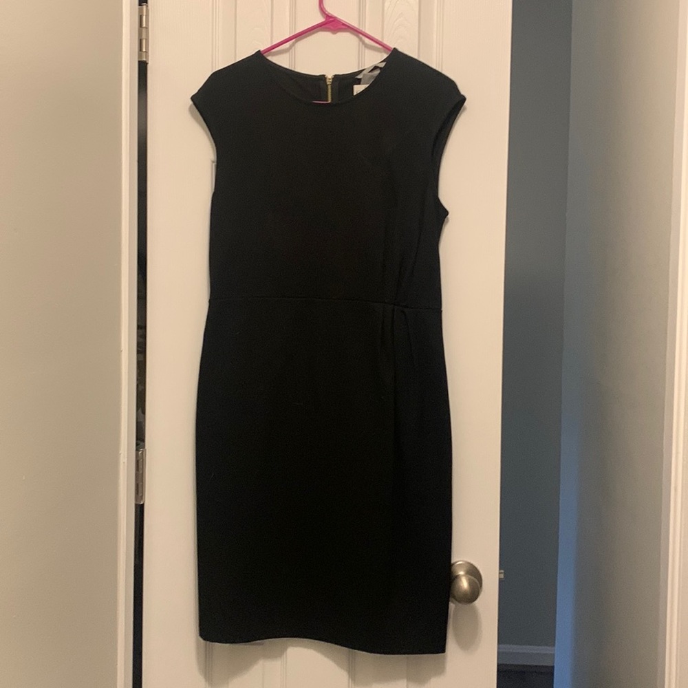 Brand new! Size medium black dress.